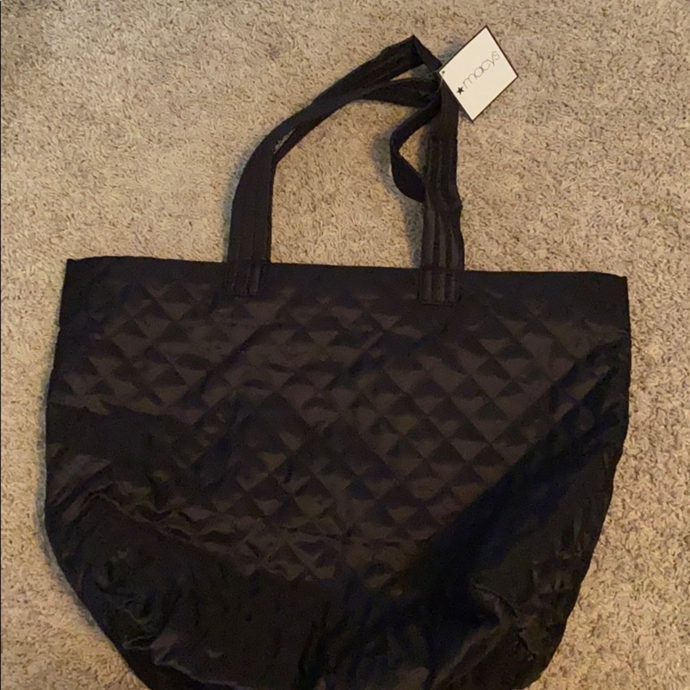 Macy’s black satin tote bag